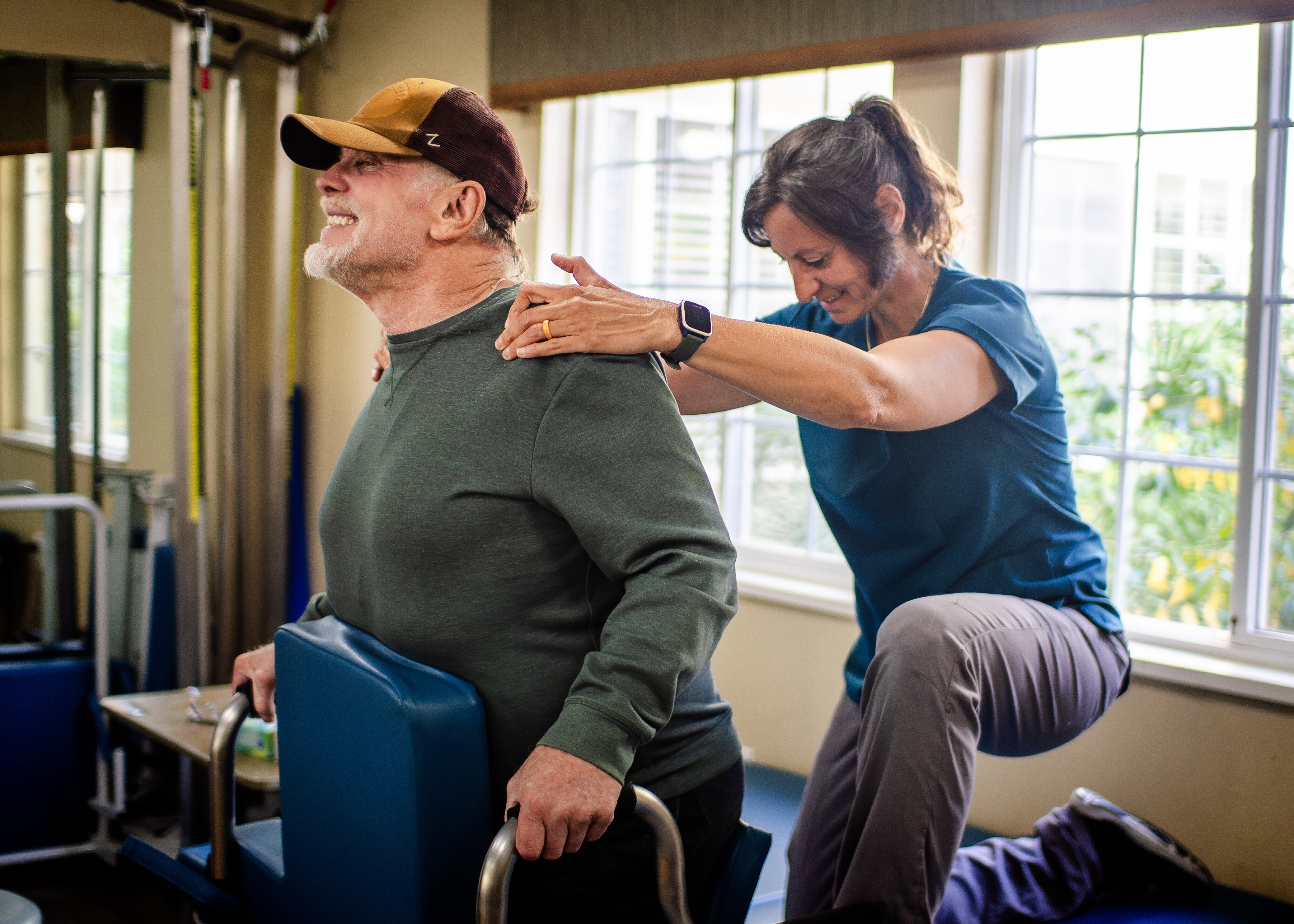 Physical therapist working with resident at Mt. Olympus